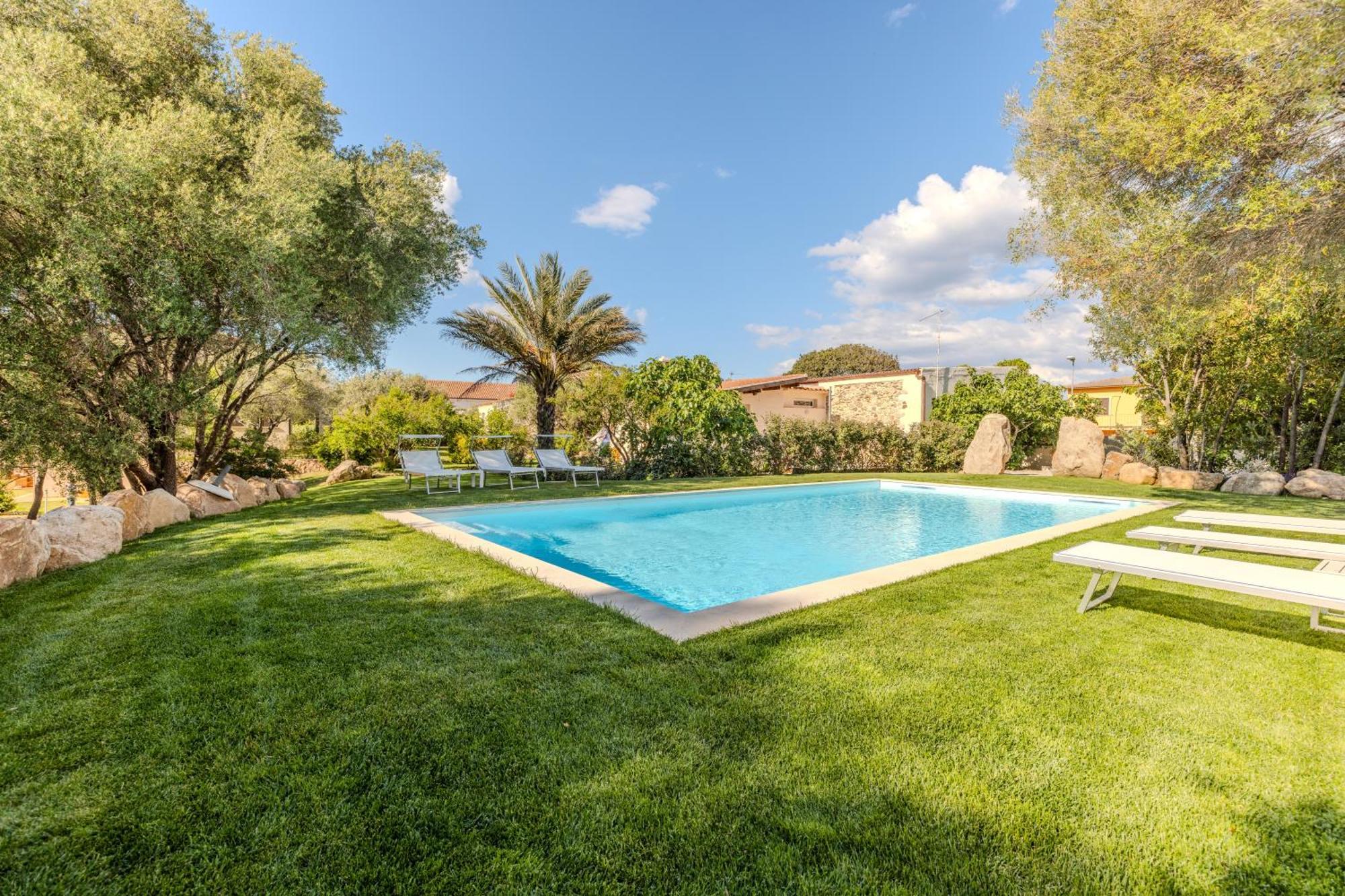Apartamento Stazzo San Teodoro L'Olivastro Piscina Condivisa Exterior foto